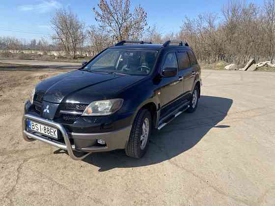 Mitsubishi Outlander бензин 2.0 Снежное