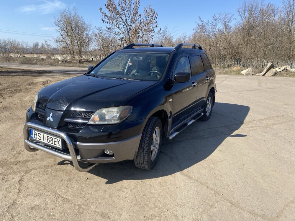 Mitsubishi Outlander бензин 2.0 Снежное - изображение 2