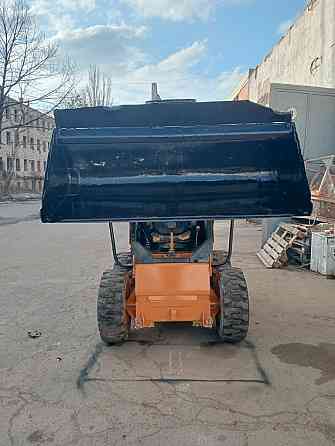 Продам ковшевой погрузчик  боб кем мустанг Ясиноватая