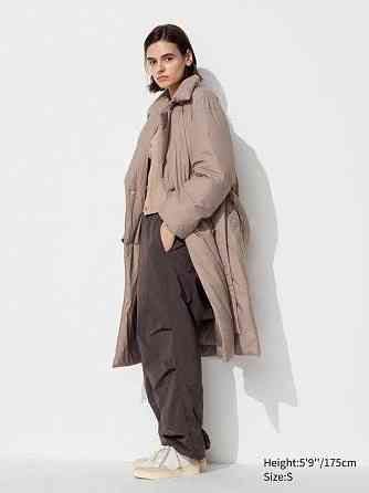Uniqlo . Довге пухове пальто з поясом . Торез